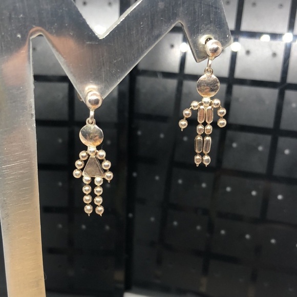 Jewelry - Sterling silver 925 boy girl dangle earrings statement.